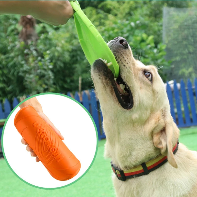 A dog playing with a flexible, bright green silicone flying disc, with an inset showing the folded orange toy.