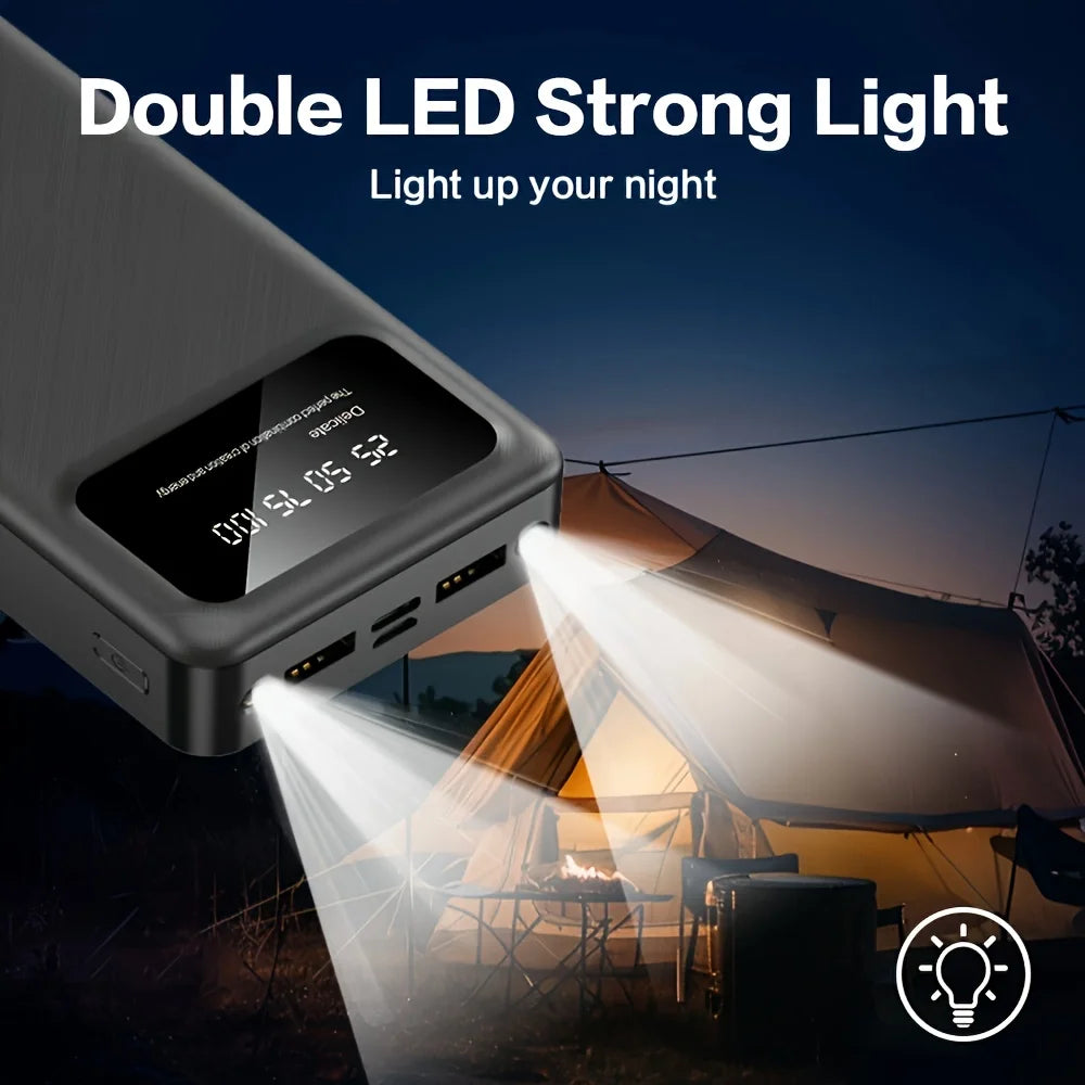 Black 50,000mAh power bank featuring a digital LED display and bright dual-LED torch for camping at night.