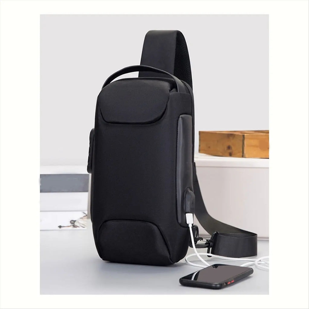 Sleek black, waterproof crossbody bag with an integrated USB charging port and adjustable shoulder strap.