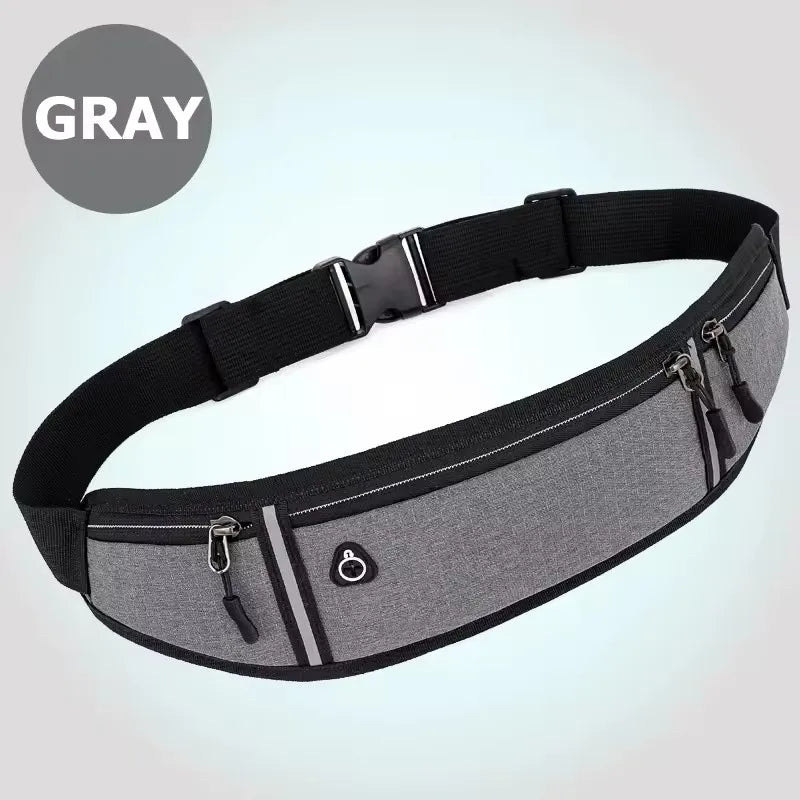 Grey running waist belt with a black adjustable strap, secure buckle, multiple zipped pockets and a headphone port.