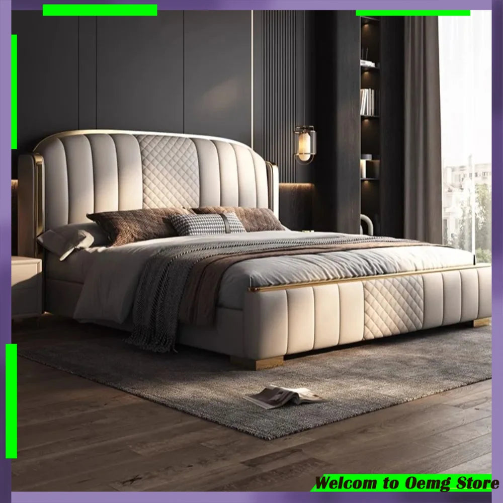 Cream upholstered bed frame with a curved, quilted headboard and gold trim in a modern, luxury bedroom setting.