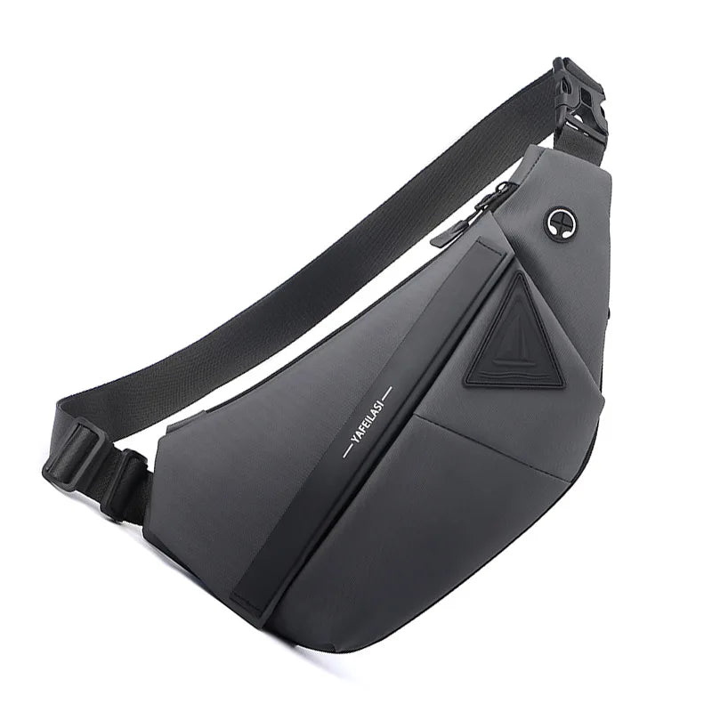 Grey anti-theft crossbody sling bag with adjustable strap, zipped compartments and built-in headphone port.