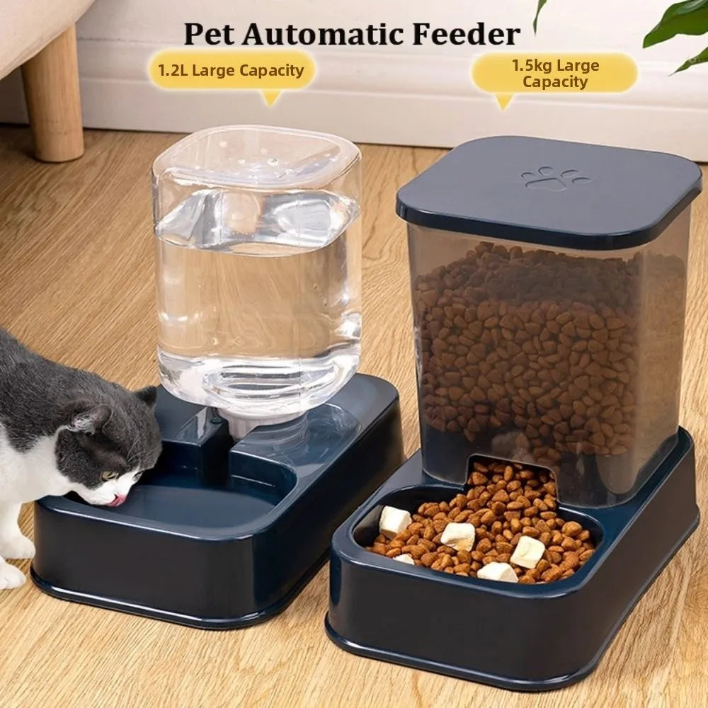 Dark blue automatic pet food and water dispenser set with transparent containers, sitting on a wooden floor.
