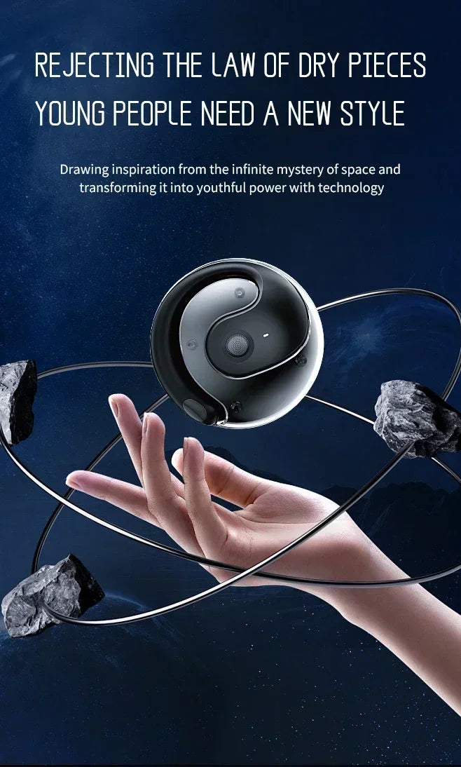 Round black and white yin-yang shaped tech gadget hovering above a hand against a space-themed background.