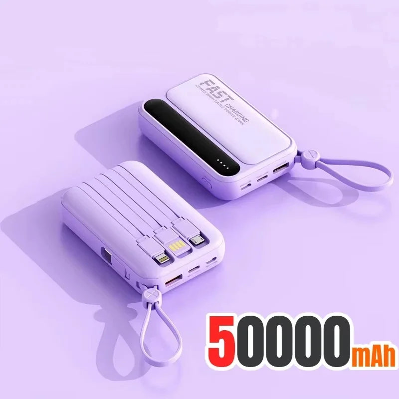 Two lilac 50,000mAh portable power banks with built-in charging cables and carry lanyards on a matching purple background.