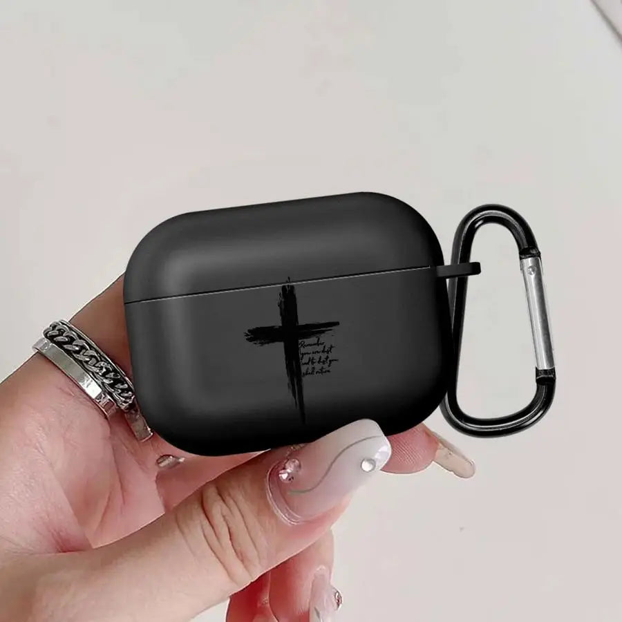Black matte AirPods Pro case featuring a black cross graphic, made of silicone, including a matching carabiner.