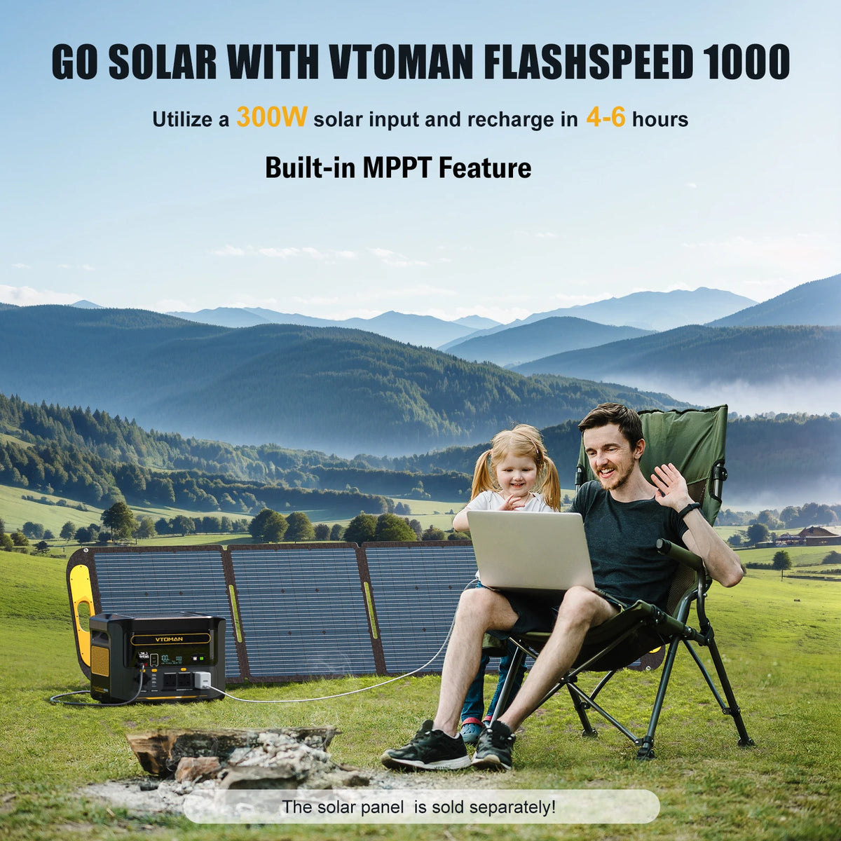 Man and child using a laptop in a field with a portable power station, solar panel, and mountains.