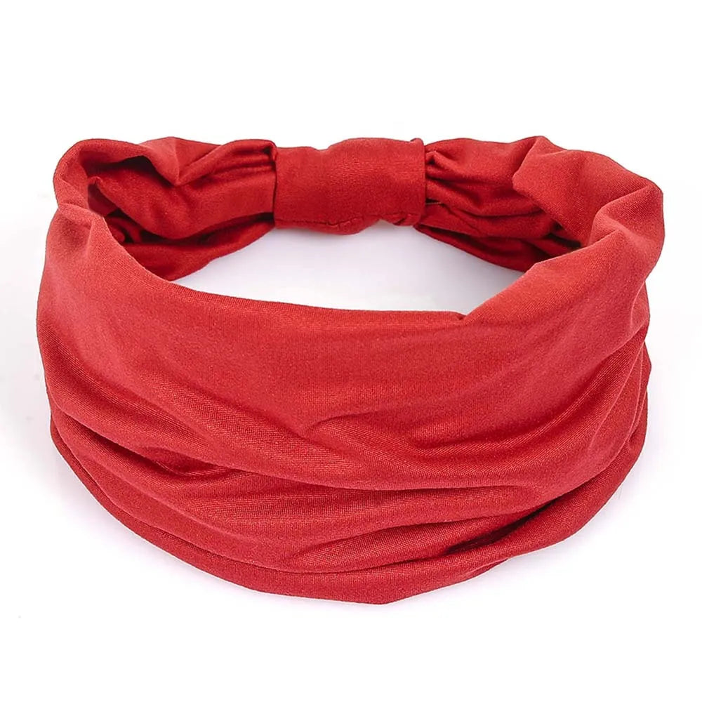 Wide red fabric headband with a soft, gathered, and knotted design.