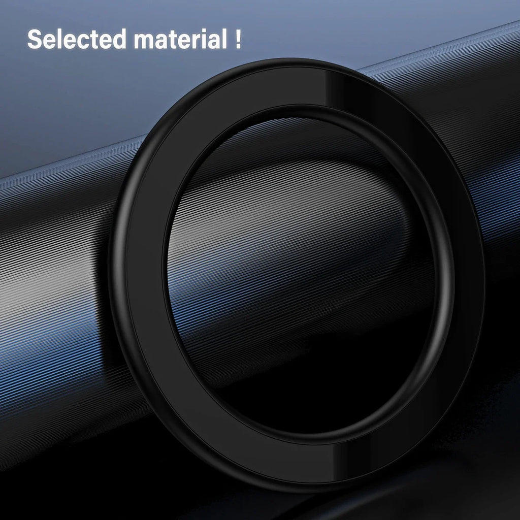 A sleek, black, circular protective ring with a smooth finish, set against a dark, textured background.