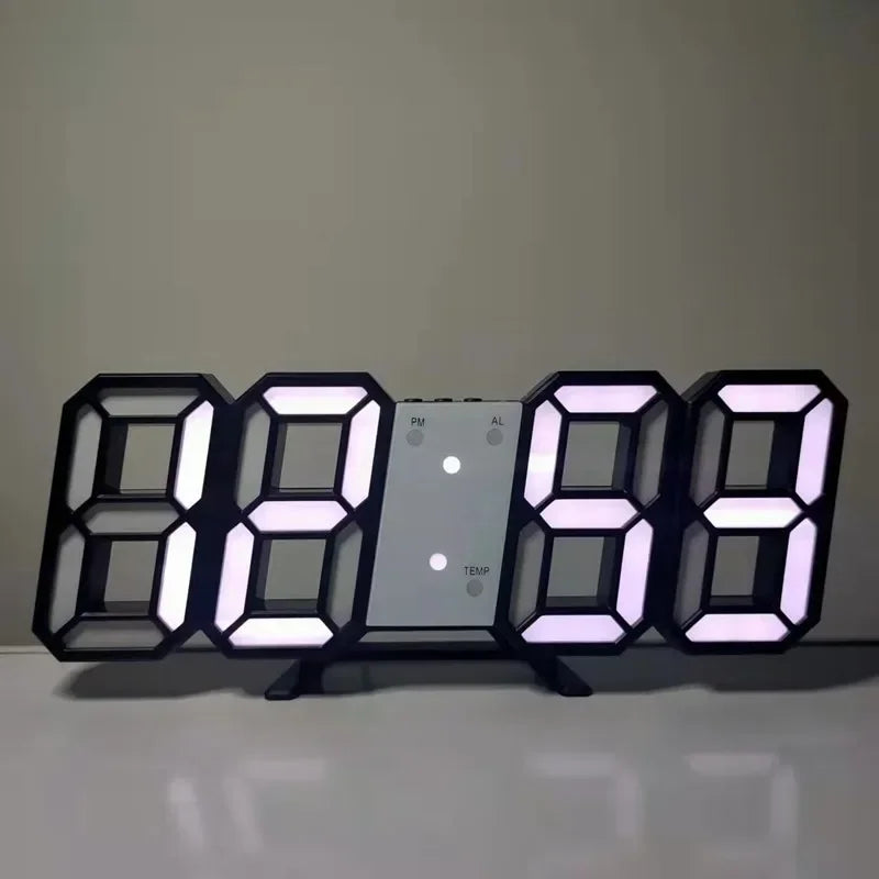 Modern black LED digital alarm clock with white glowing 3D-style numbers, a central display and desk stand.