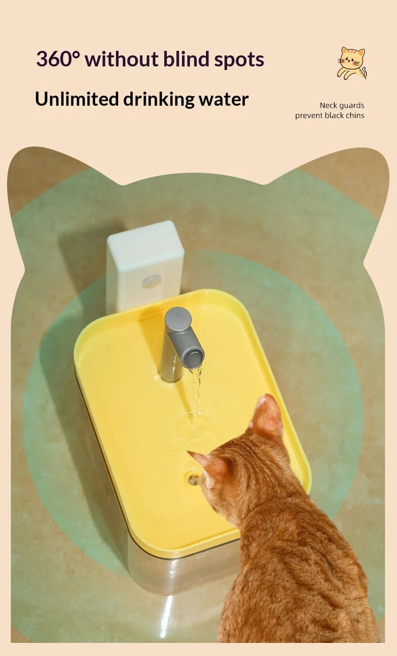 Ginger cat drinking from a modern, yellow rectangular automatic pet water fountain with a grey spout and filter.
