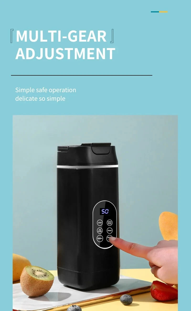 A black, cylindrical portable blender with a digital display and touch buttons, surrounded by fresh fruit on a table.