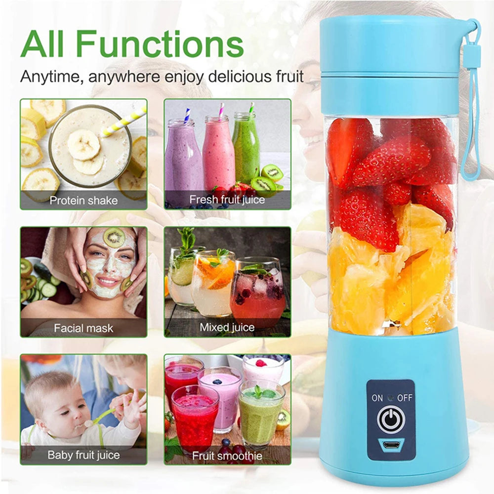 Portable light blue electric blender with a clear container filled with fresh strawberries and orange slices.