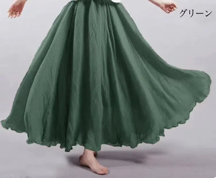 A flowy, dark green maxi skirt with a flared, voluminous silhouette and soft, gathered fabric texture.
