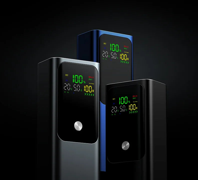 Three sleek black and blue laptop power banks with digital LED displays showing charging status against a black background.