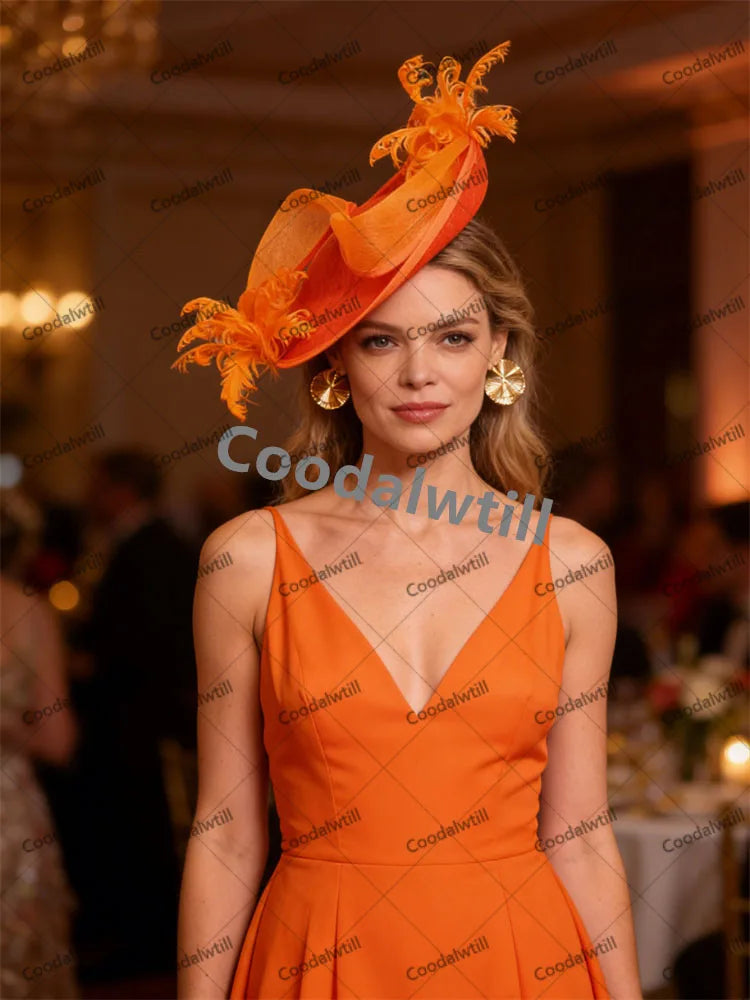 Elegant orange fascinator headpiece featuring curved structural fabric and decorative feathers on one side.