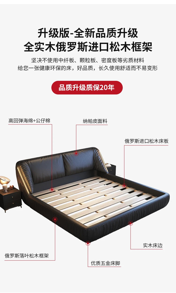 Modern king-size upholstered bed frame in black faux leather with a solid wood frame, foam padding and slatted base.