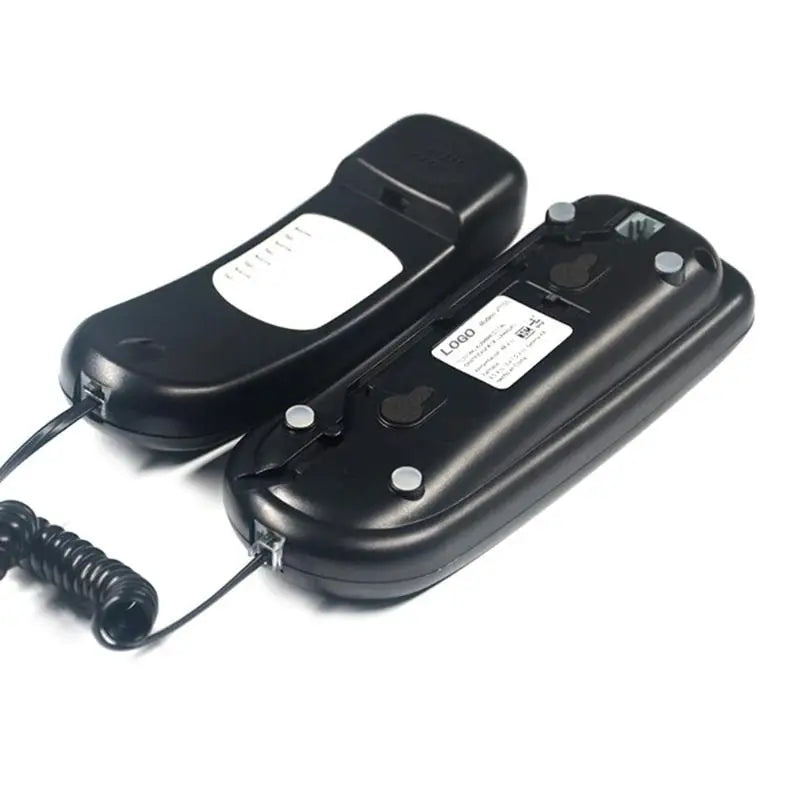Black wall-mountable telephone handset with coiled cord, shown from the underside, featuring a mounting base.