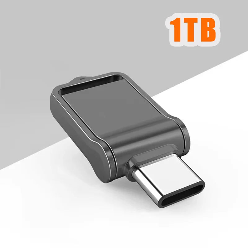 Sleek, dark grey 1TB USB-C flash drive with a modern, compact, and portable design.