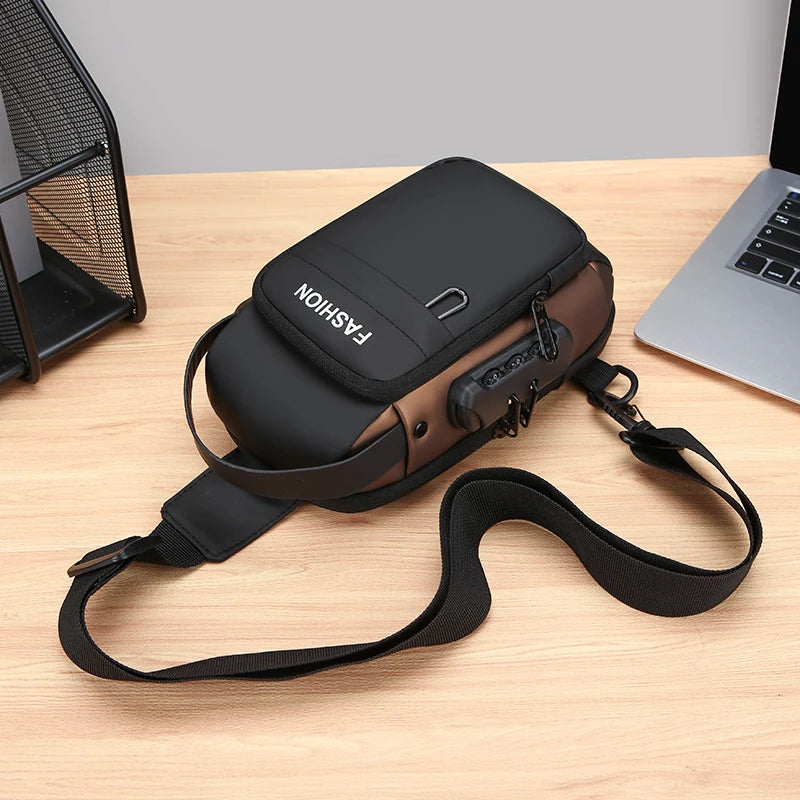 Black and bronze anti-theft crossbody chest bag with an adjustable strap, combination lock, and side USB port.