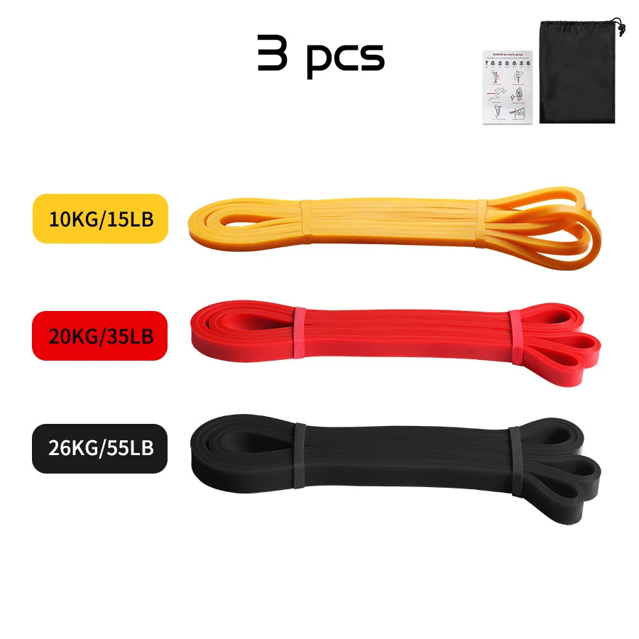 Three exercise resistance bands in yellow (10kg), red (20kg), and black (26kg), with a carry bag and manual.