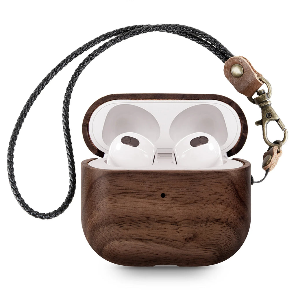 Dark wood AirPods 3 case with a black braided wrist strap and vintage metal clasp, isolated on white.