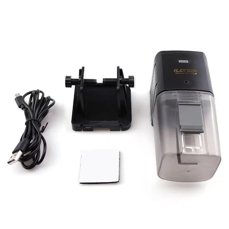 Automatic fish feeder with black mounting bracket, adhesive pad, and USB charging cable on a white background.