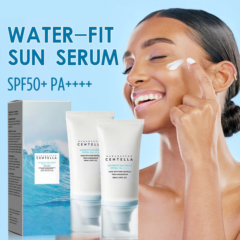 Two white tubes of SPF50+ sun serum with a matching box, displayed next to a smiling woman applying the cream.