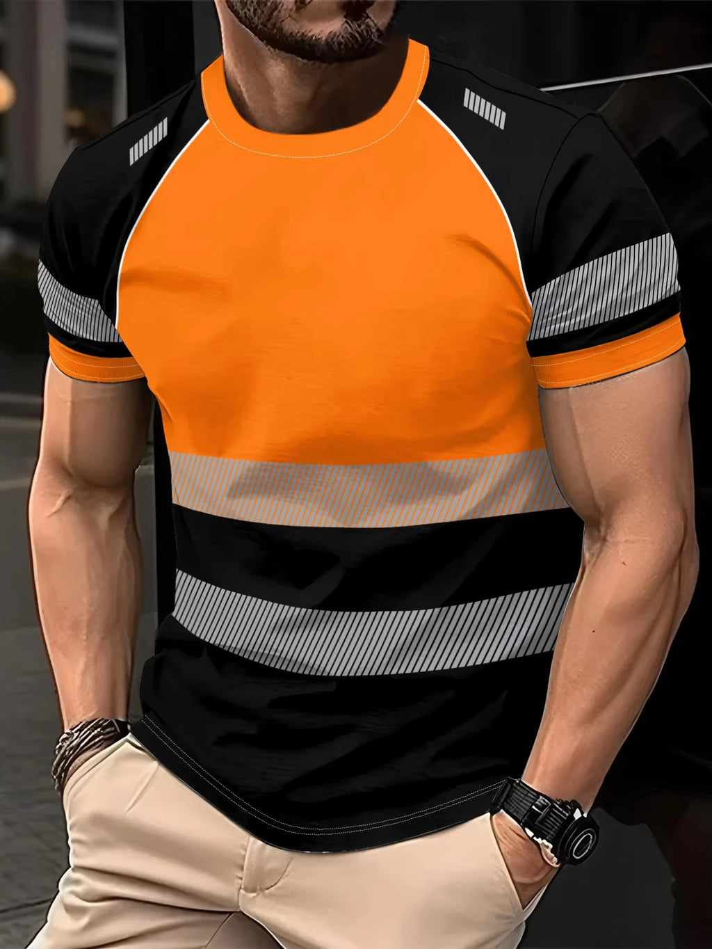 Men’s high-visibility T-shirt in orange and black with reflective silver stripes on the sleeves and chest.