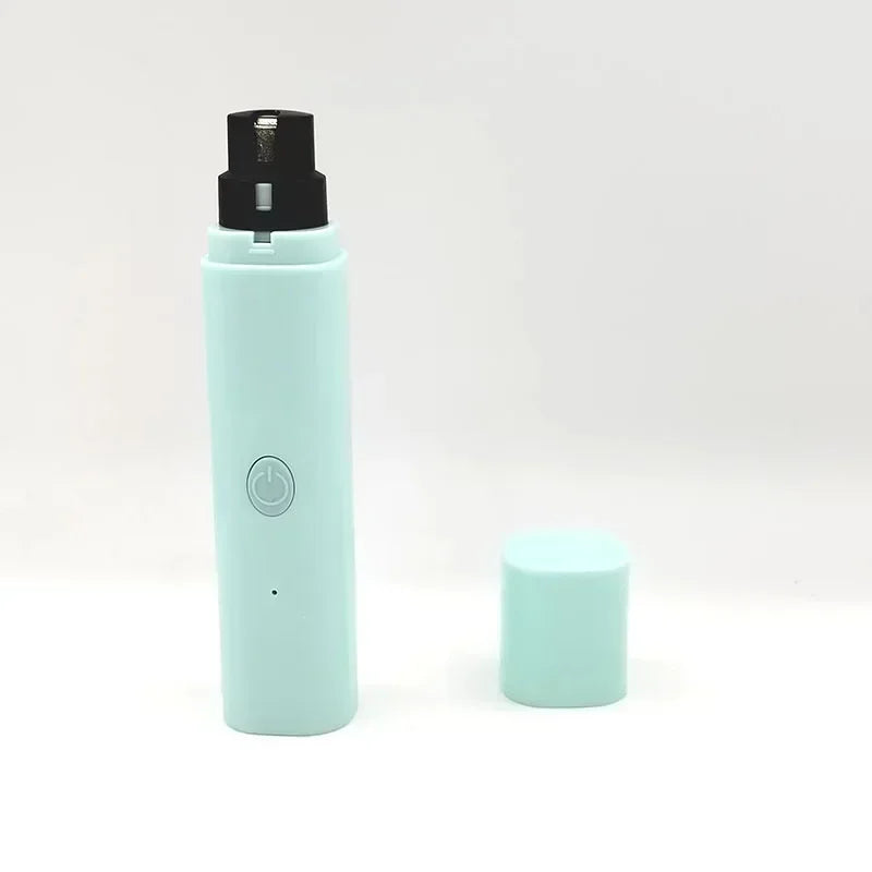 Pale mint green electric pet nail grinder with a black grinding head, power button and a matching removable cap.