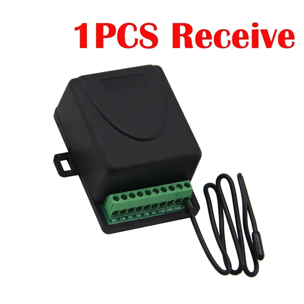 Black plastic wireless receiver module with an external probe, green screw terminals, and labeled connection pins.
