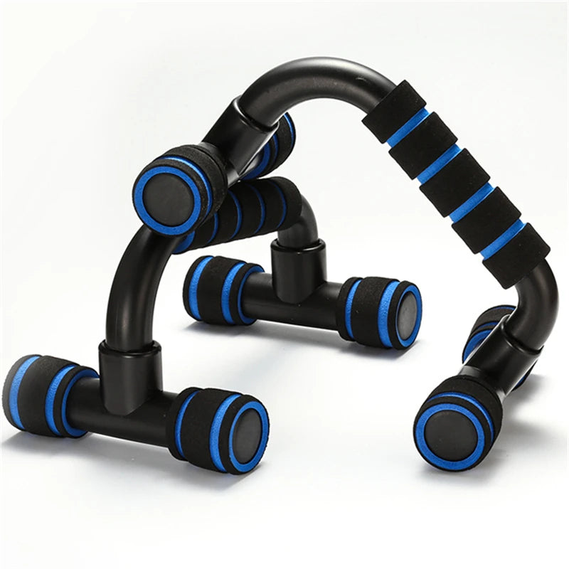 Pair of black push-up bars with blue foam-padded grips, isolated on a white background.