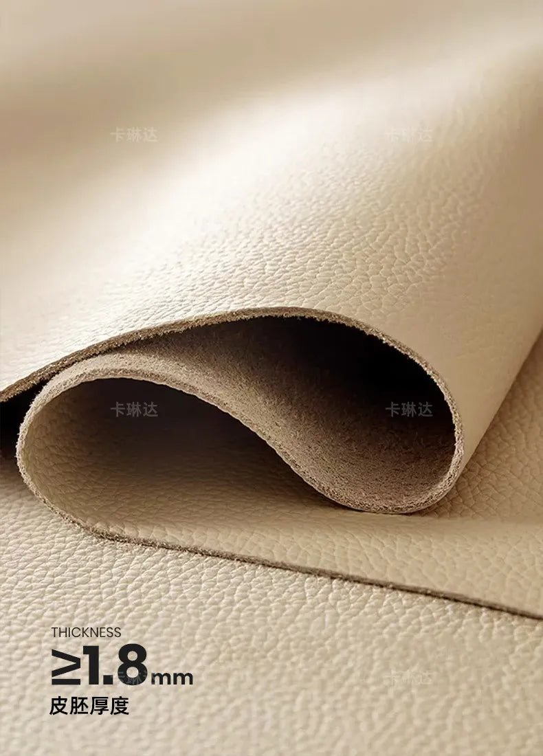 Close-up of durable, high-quality cream textured upholstery material, showing a thickness of at least 1.8mm.