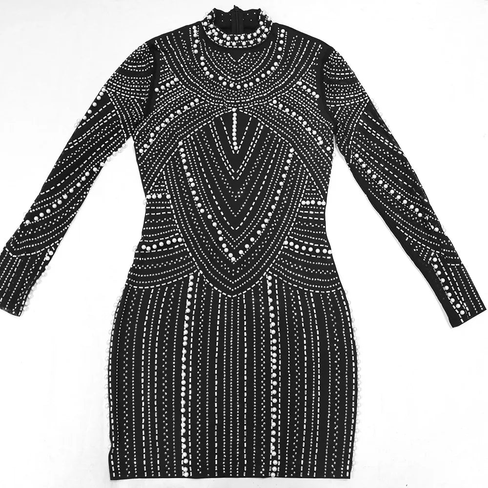 Black long-sleeve mini dress covered in white pearl and crystal rhinestones in intricate geometric patterns.