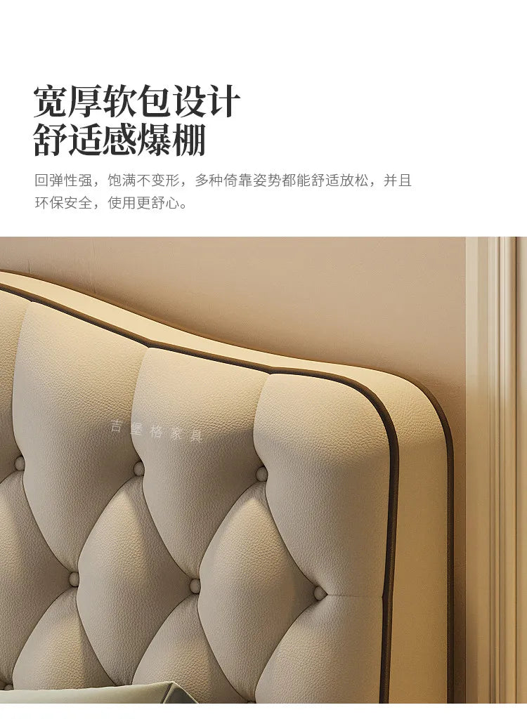 Close-up of a modern, cream-coloured upholstered queen bed frame with elegant button-tufted detail and dark piping.