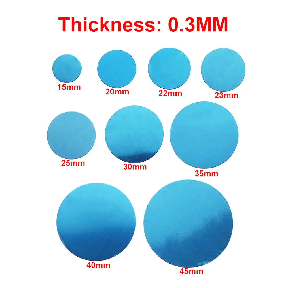 Nine blue circular adhesive discs in various sizes from 15mm to 45mm, all 0.3mm thick, arranged against a white background.