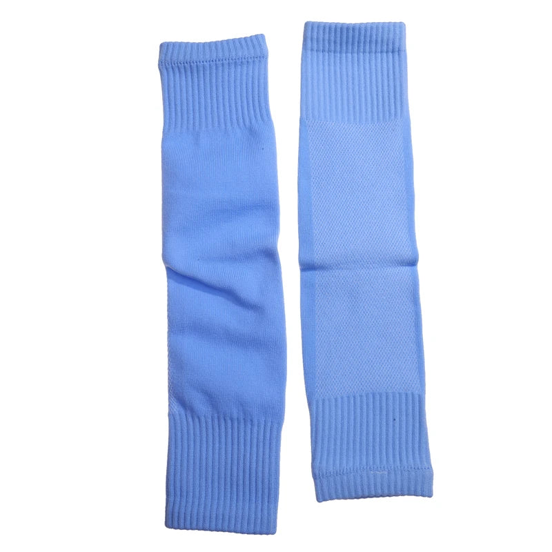 Pair of light blue ribbed sports leg sleeves or football sock tie-ups with elasticated cuffs.