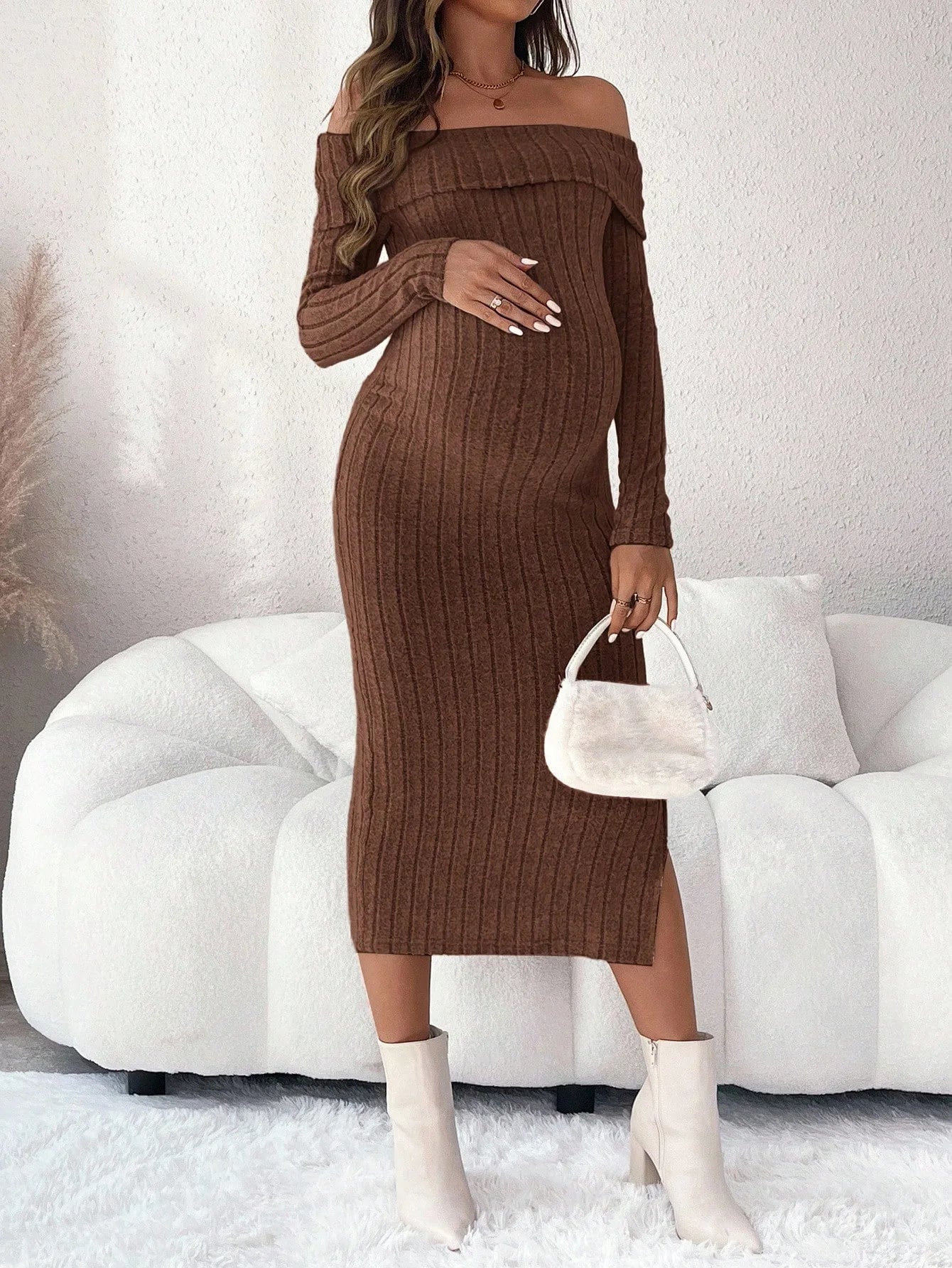 Brown maternity midi dress with off-the-shoulder neckline, long sleeves, and side slit in soft ribbed knit fabric.