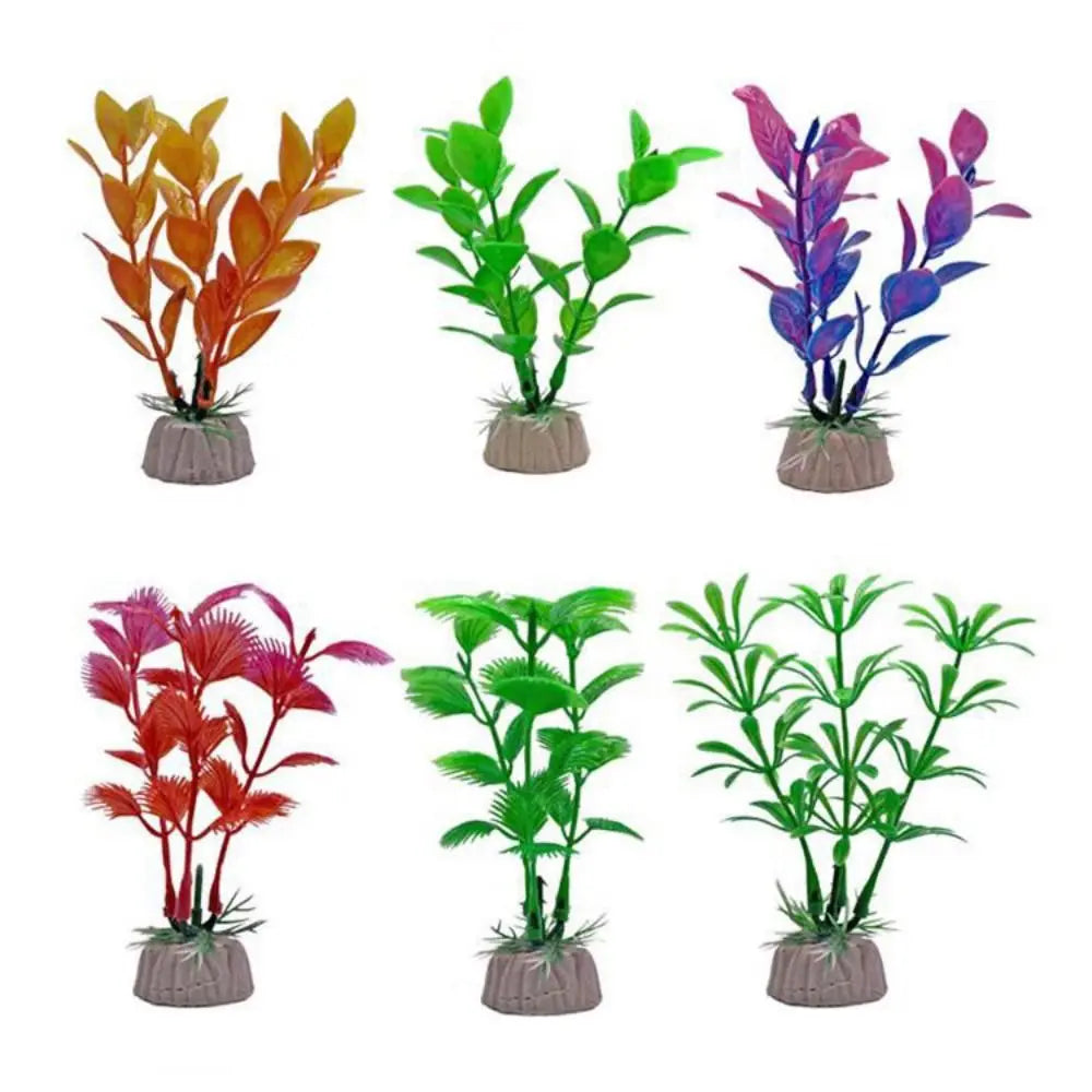 Six colorful artificial aquarium plants with varied leaf shapes, each rooted in a small, weighted stone-like base.