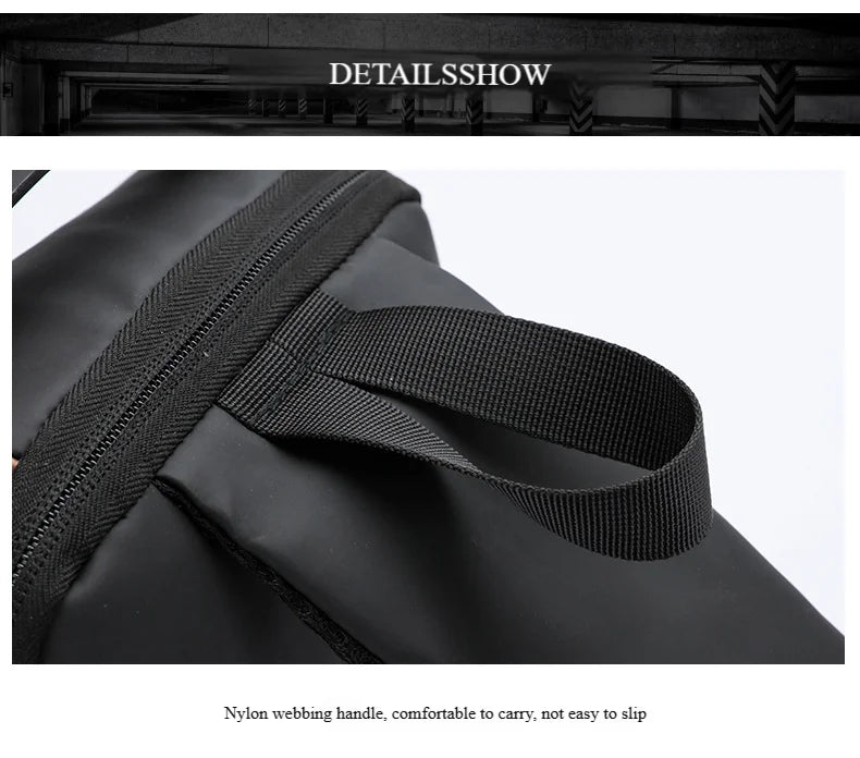 Close-up of a black anti-theft chest bag featuring a durable, non-slip nylon webbing carry handle and zipper detail.