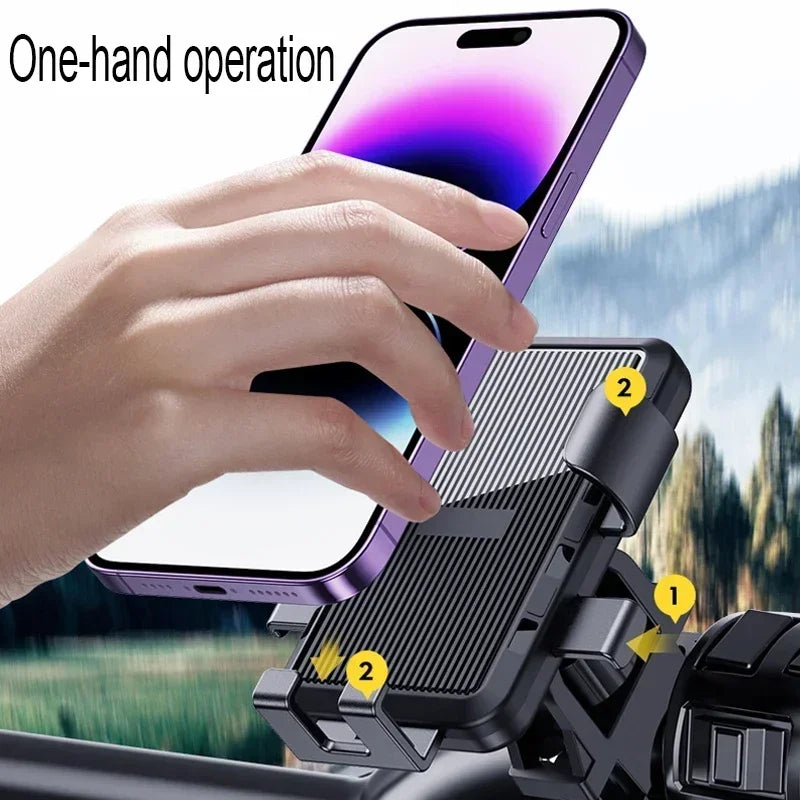 Black smartphone car mount with adjustable arms for one-hand operation, holding a purple smartphone.