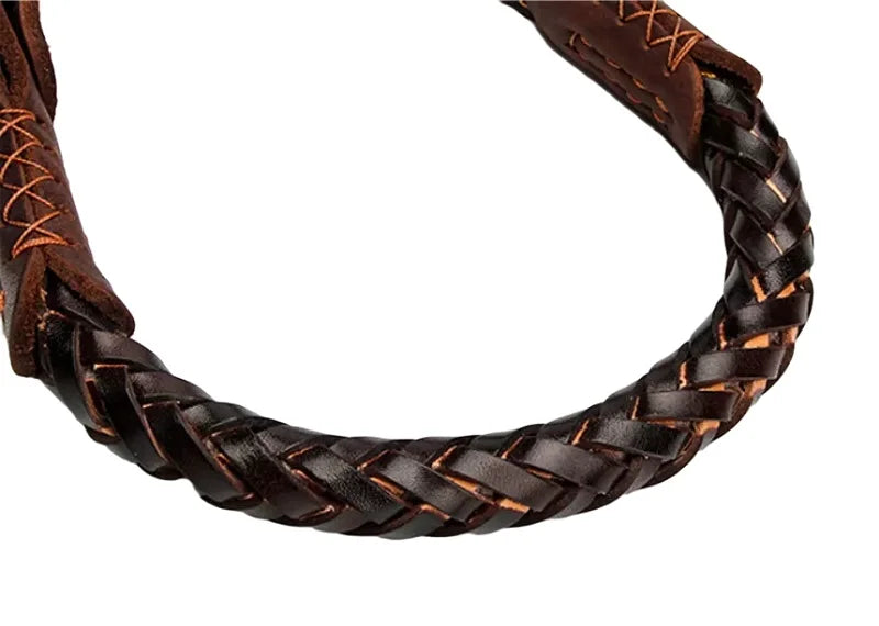 Close-up of a dark brown, braided real leather dog collar with robust stitched detailing.