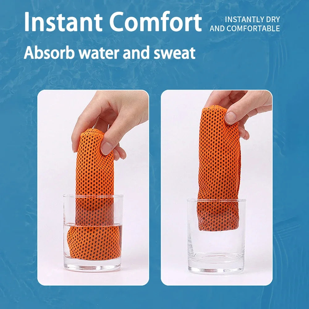 Hand holding an orange, mesh-textured absorbent cooling towel, shown being dipped into and lifted out of a glass.