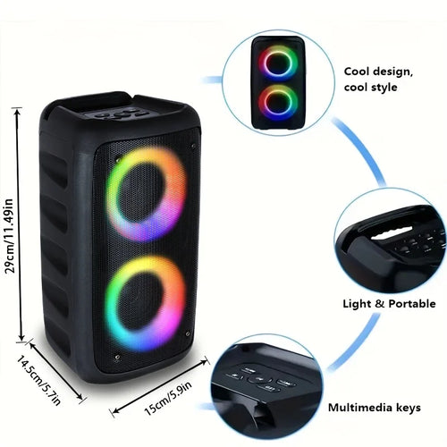 Portable black wireless speaker with LED ring lights, a top carry handle, and multimedia control buttons.