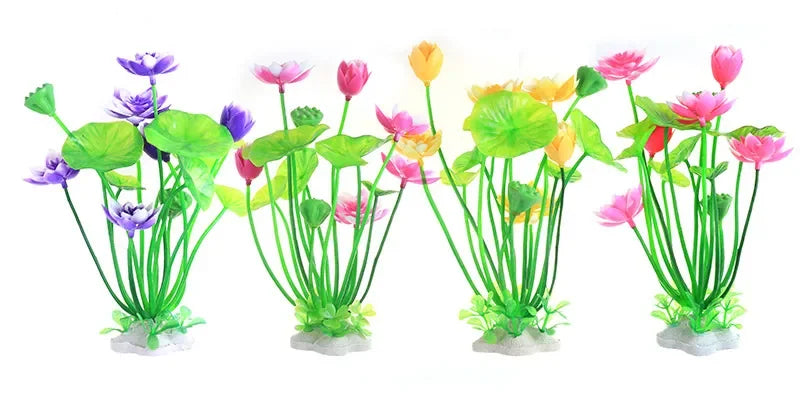 Four artificial aquarium plants with green stems, lotus-style leaves, and colorful pink, purple, and yellow blossoms.