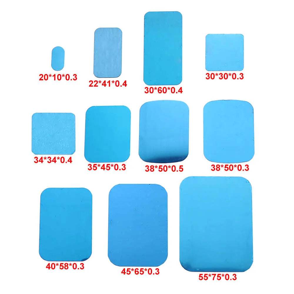 A collection of rectangular light blue thermal conductive pads of various sizes with red dimension text underneath.