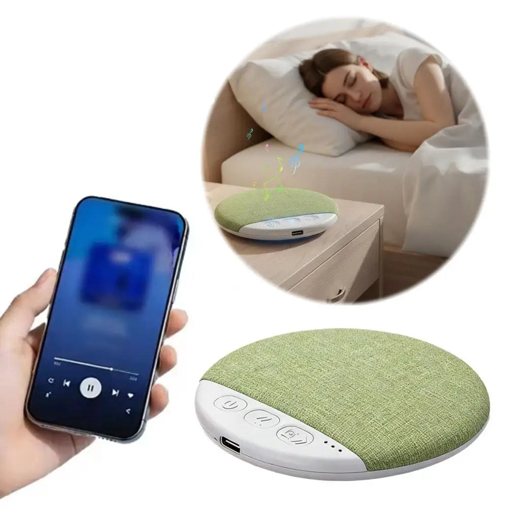 Round, green fabric wireless sleep speaker with control buttons, shown being paired with a smartphone.