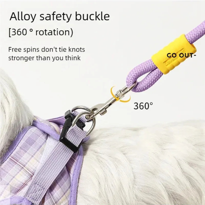 Purple dog lead with a yellow grip, featuring a 360-degree rotating metal safety clip attached to a dog harness.
