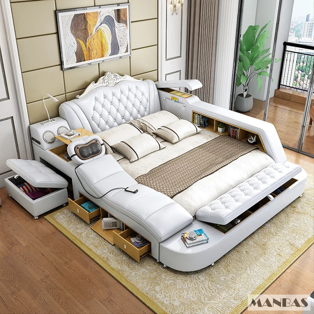 White leather bed frame with tufted headboard, integrated massage unit, storage drawers, shelves and built-in speakers.