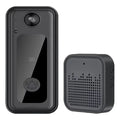 Sleek black wireless HD smart video doorbell with integrated camera and matching chime unit.